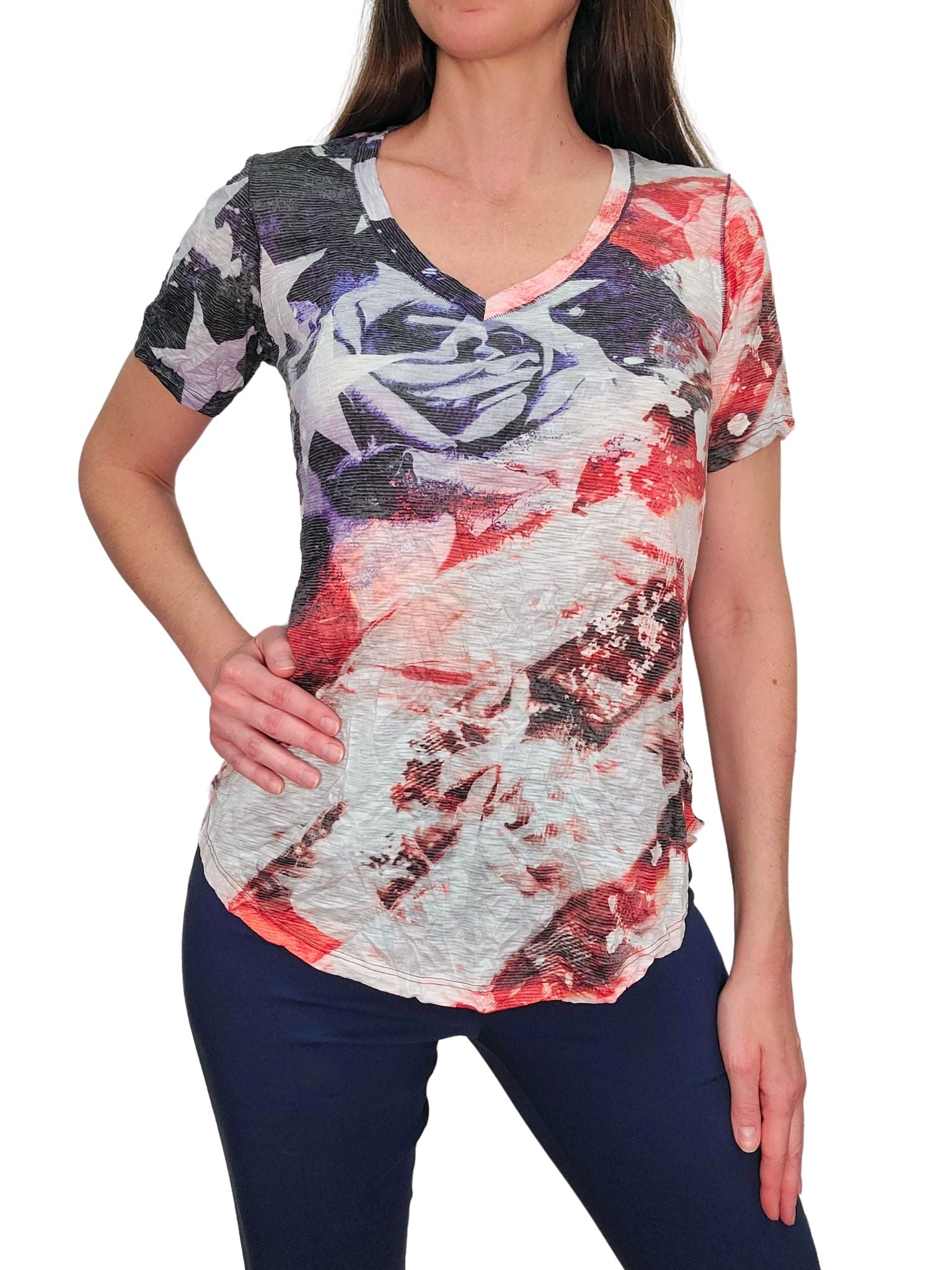 Women’s soft V-neck tee with edgy abstract Americana print – hand-sketched stars and watercolor blue roses on faded red and white stripes. Breathable light-weight fabric for concerts, festivals, or patriotic streetwear